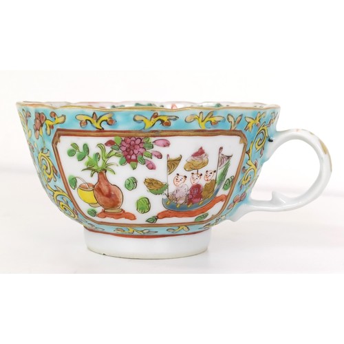 664 - A Chinese famille rose cup and saucer