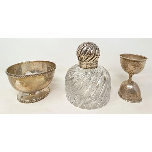 705 - A George V silver sugar bowl, a silver shot measure and a cut glass inkwell, with a silver mount (3)