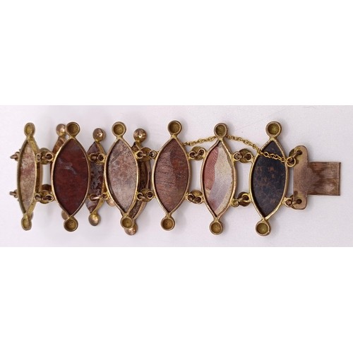 745 - A late 19th/early 20th century gilt metal and multi-coloured hardstone bracelet