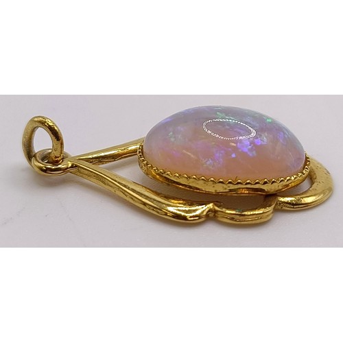 749 - A silver gilt and opal pendant