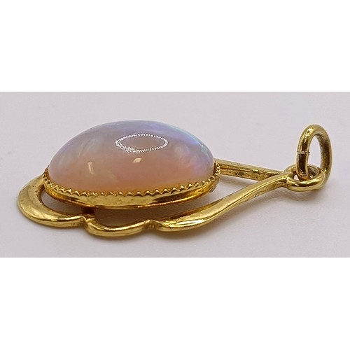 749 - A silver gilt and opal pendant