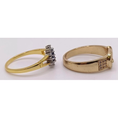 750 - A gilt metal and white stone belt ring, and a silver gilt and gem set ring (2)