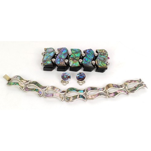 820 - A sterling silver and abalone shell bracelet, an expanding bracelet, and a pair of clip on earrings ... 