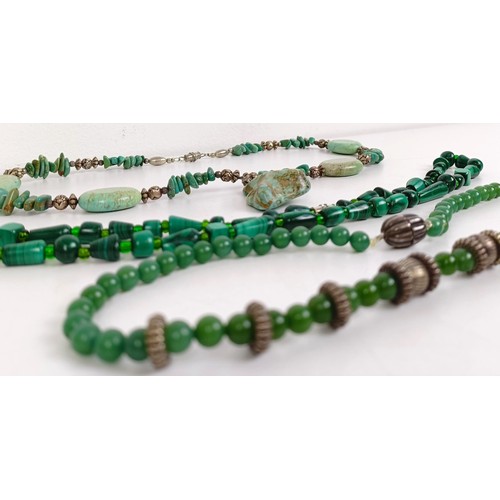 831 - A green bead necklace, and two others (3)