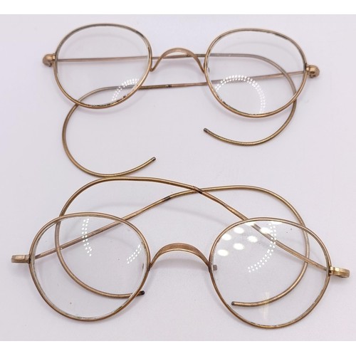 838 - Assorted vintage spectacles, with yellow metal rims and assorted costume jewellery