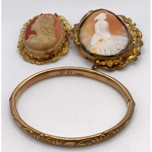 839 - A cameo brooch, decorated a lady, a rolled gold bangle, and a cameo style brooch (3)