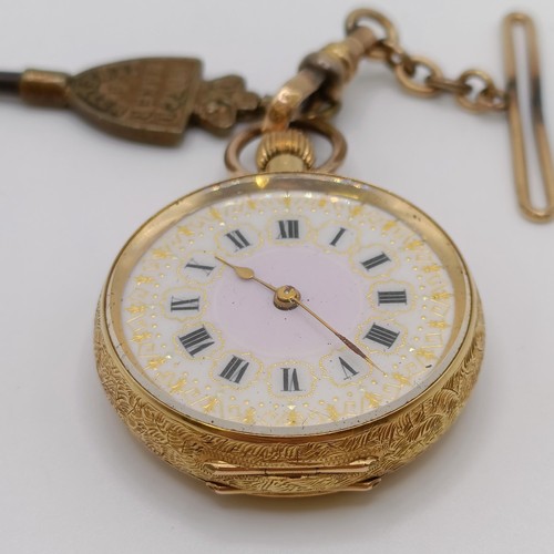 842 - A ladies 18ct gold open face fob watch, with a yellow metal clasp, with key, running, in a vintage j... 