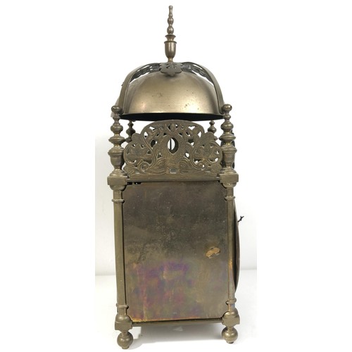 853 - A 17th century style lantern clock, with a single fusee movement striking on a bell, in a brass case... 