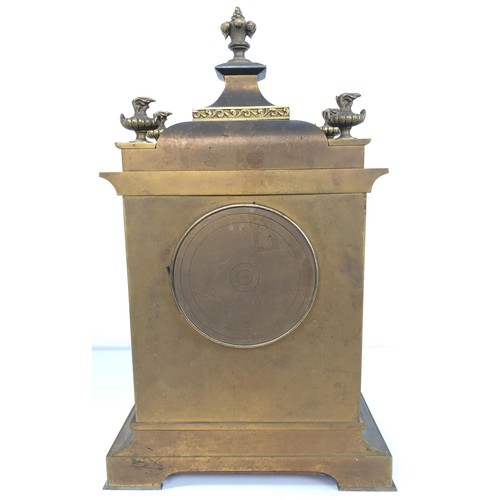 854 - A mantel clock, with an eight day movement, striking on a chime, in a gilt metal case, 40 cm high, a... 