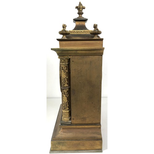 854 - A mantel clock, with an eight day movement, striking on a chime, in a gilt metal case, 40 cm high, a... 