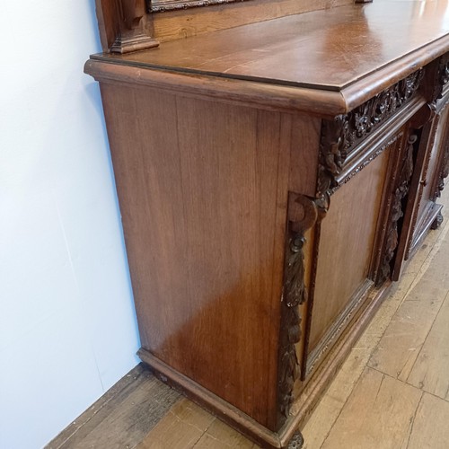 910 - A Victorian oak buffet, with a raised back, on a base with two drawers and two cupboard doors, 153 c... 