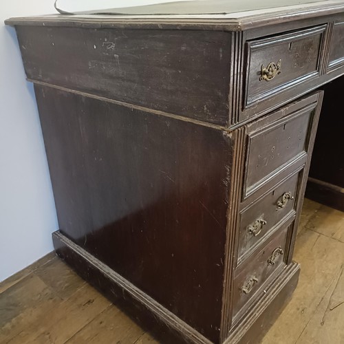 912 - A Victorian mahogany pedestal desk, of nine drawer configuration, 123 cm wide