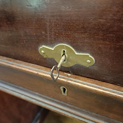 913 - A Victorian mahogany cylinder desk, 139 cm wide