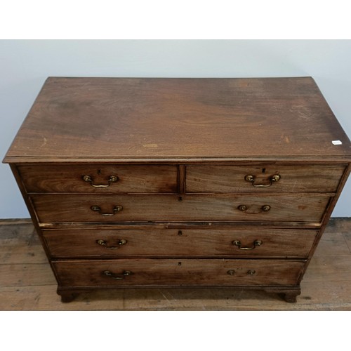 914 - A George III mahogany chest, having two short and three long drawers, 124 cm wide