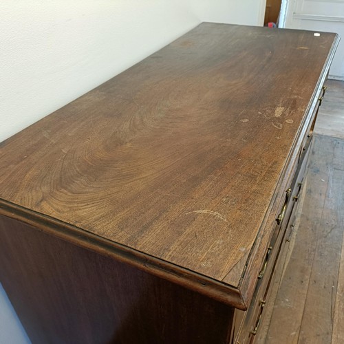 914 - A George III mahogany chest, having two short and three long drawers, 124 cm wide