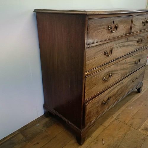 914 - A George III mahogany chest, having two short and three long drawers, 124 cm wide