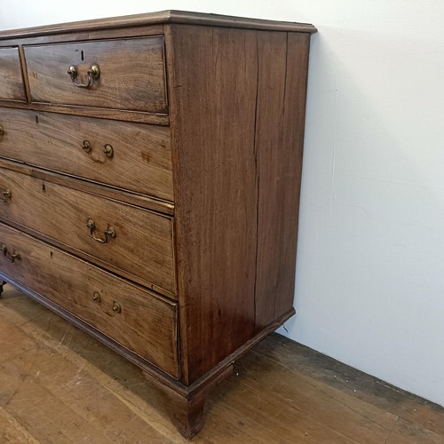 914 - A George III mahogany chest, having two short and three long drawers, 124 cm wide