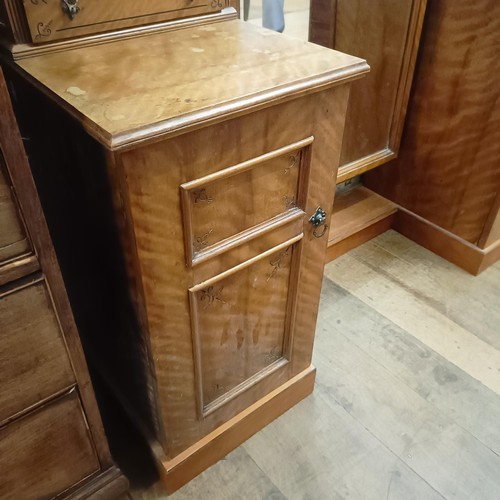 915 - A 19th century satin birch cheval mirror, flanked by two cupboards, 160 cm wide