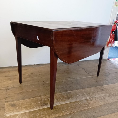 917 - A 19th century mahogany Pembroke table, on tapering square legs, 102 cm wide