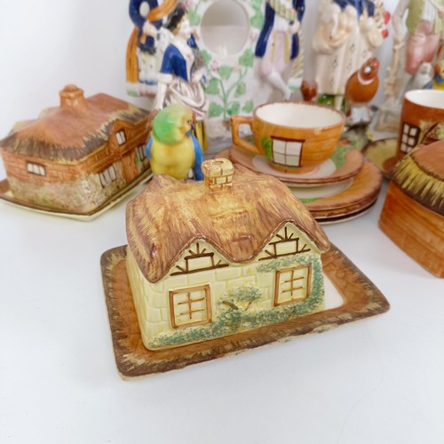 598 - A Staffordshire flatback pocket watch stand, a pastille burner, and assorted Prices cottage wares (b... 