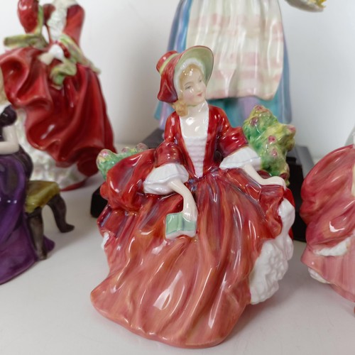 594 - A Royal Doulton figure, converted to a lamp, and five other Doulton figures (6)