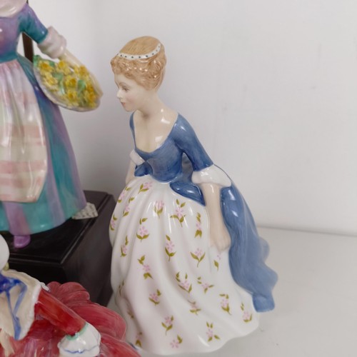 594 - A Royal Doulton figure, converted to a lamp, and five other Doulton figures (6)