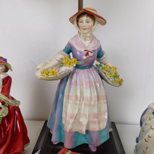 594 - A Royal Doulton figure, converted to a lamp, and five other Doulton figures (6)