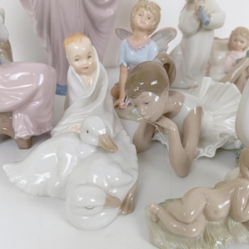 593 - A Lladro figure of a woman, 32 cm high, assorted other Lladro and Lladro style figures (13)