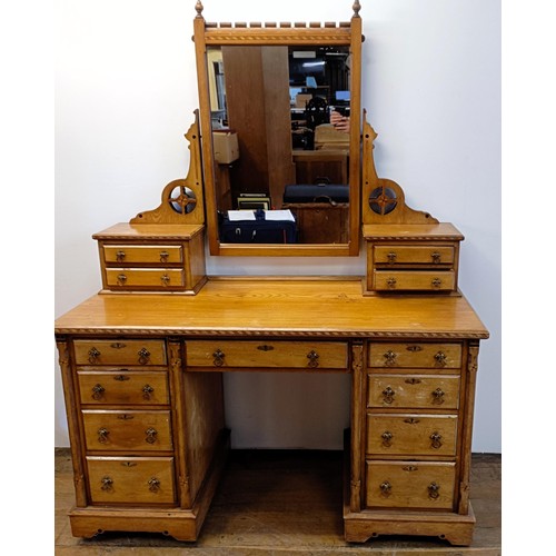 929 - An Arts & Crafts inlaid ash dressing table, in the manner of Bruce Talbot, 132 cm wide