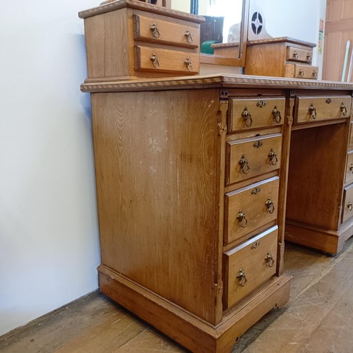 929 - An Arts & Crafts inlaid ash dressing table, in the manner of Bruce Talbot, 132 cm wide