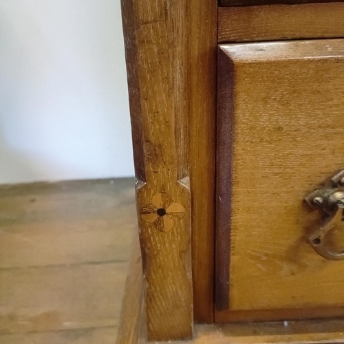 929 - An Arts & Crafts inlaid ash dressing table, in the manner of Bruce Talbot, 132 cm wide