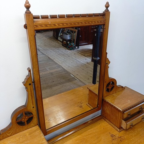 929 - An Arts & Crafts inlaid ash dressing table, in the manner of Bruce Talbot, 132 cm wide