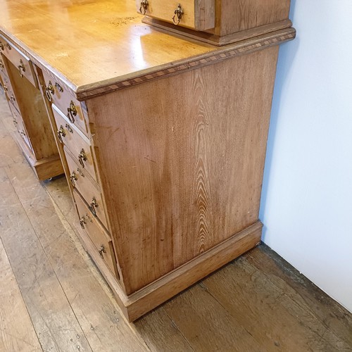 929 - An Arts & Crafts inlaid ash dressing table, in the manner of Bruce Talbot, 132 cm wide