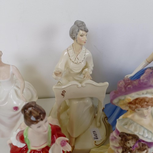 591 - A Royal Doulton figure, Autumn Breezes HN1913, and assorted Royal Doulton and other figures (12)