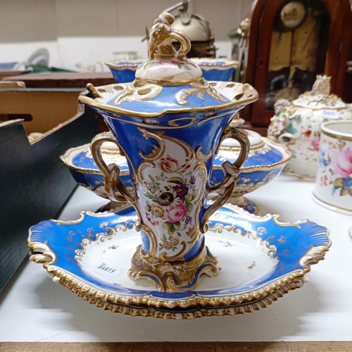 587 - A 19th century bowl on stand with a blue border, decorated flowers, highlighted in gilt, and other s... 