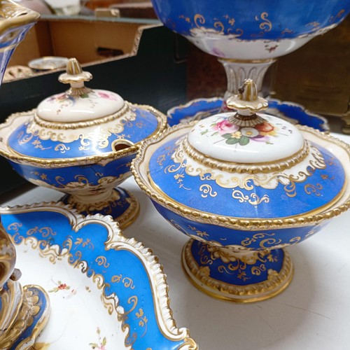 587 - A 19th century bowl on stand with a blue border, decorated flowers, highlighted in gilt, and other s... 