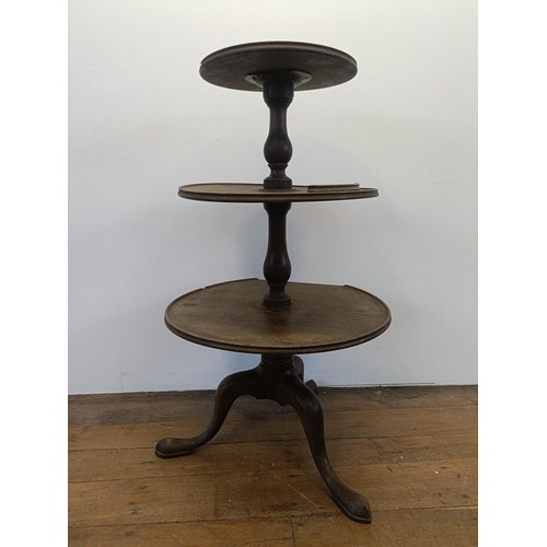 932 - A 19th century mahogany three tier dumb waiter, 60 cm diameter, in need of restoration