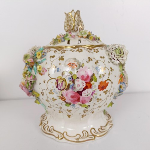 586 - A 19th century floral encrusted vase and cover, 21 cm high, various losses, and three mugs (4)