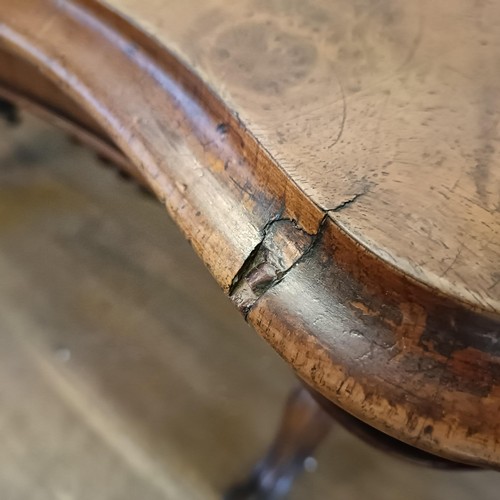 934 - A 19th century walnut serpentine sided table, 122 cm wide