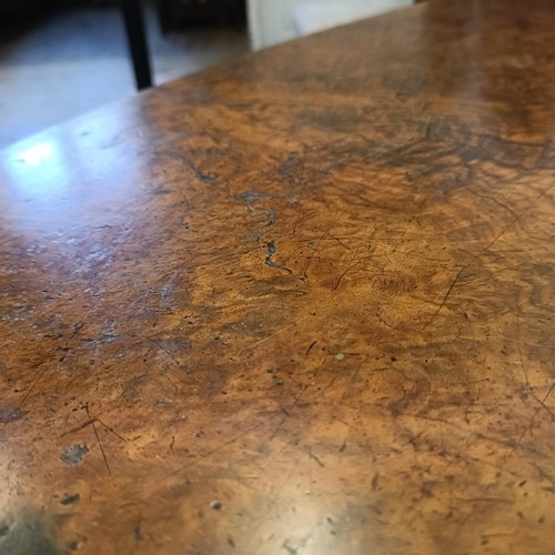 934 - A 19th century walnut serpentine sided table, 122 cm wide