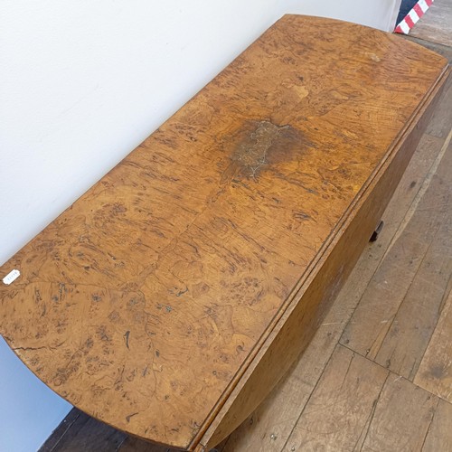 944 - A 19th century burr elm drop leaf table, 122 cm wide