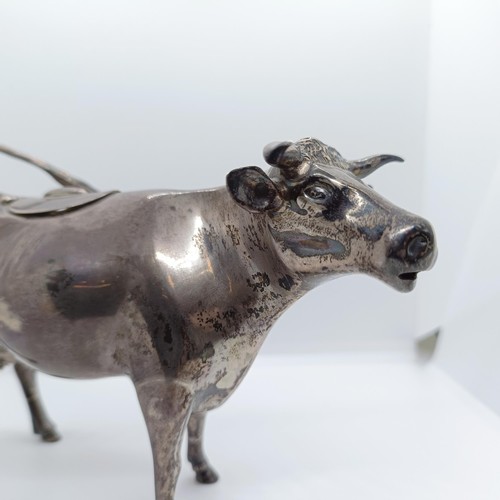 704 - A late Victorian silver cow creamer, London 1897, 6.7 ozt