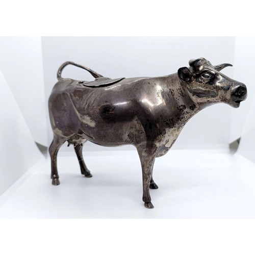 704 - A late Victorian silver cow creamer, London 1897, 6.7 ozt