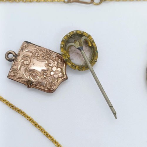 733 - A gilt metal locket, and assorted other jewellery