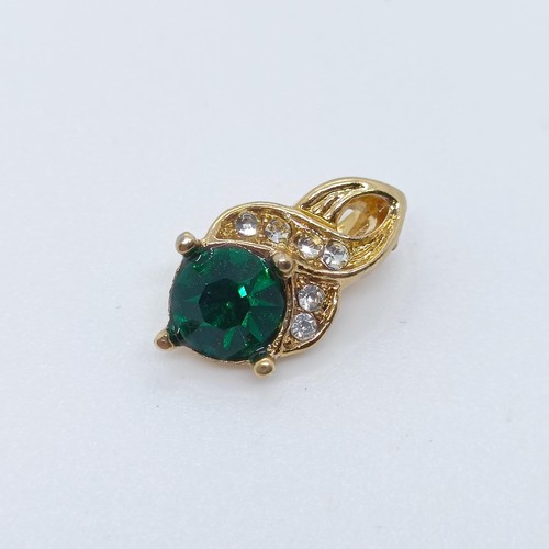 739 - A yellow coloured metal, blue and white stone dress ring, ring size R, a green and white stone penda... 