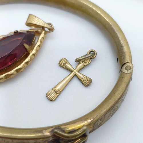 746 - A rolled gold bangle, and assorted other jewellery