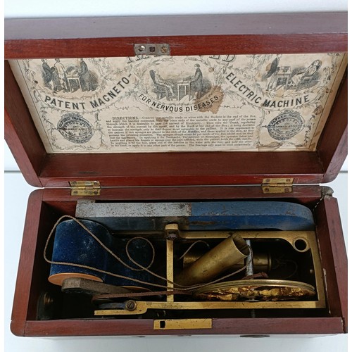 868 - An Improved Curative Magneto Electric Machine, in a mahogany case, 27 cm wide