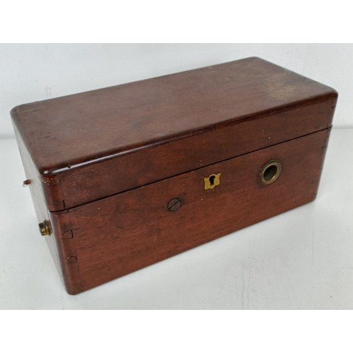 868 - An Improved Curative Magneto Electric Machine, in a mahogany case, 27 cm wide