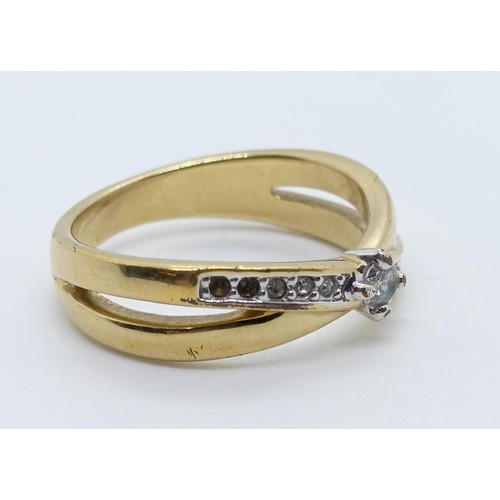 762 - A yellow metal and diamond ring, ring size O, 3.9g all in