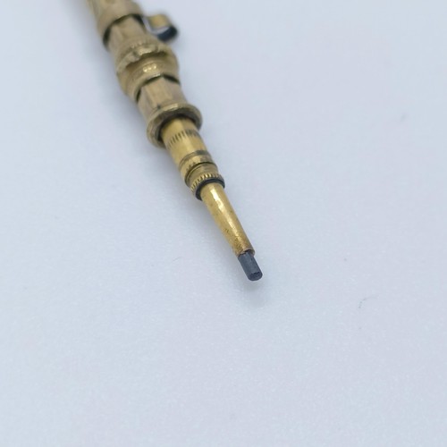 764 - A 9ct gold propelling pencil